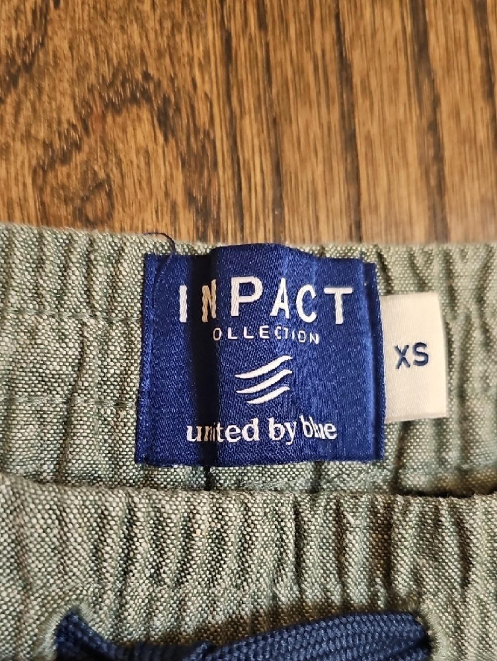 United By Blue Impact Collection Olive Drawstring Shorts with Navy Tie - Picture 2 of 7